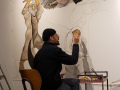 I snapped this shot of artist Hanny Khoury as he visually responds to the conflict in Gaza.