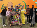 Weaving project participants for a Latitude 53 workshop. That's me in my happy face coveralls I designed.